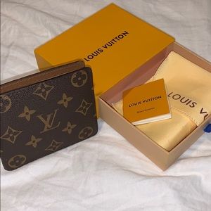 Louis Vuitton monogram wallet.